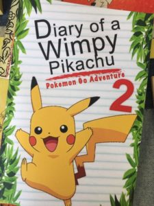A book titled: Diary of a Whimpy Pikachu.
